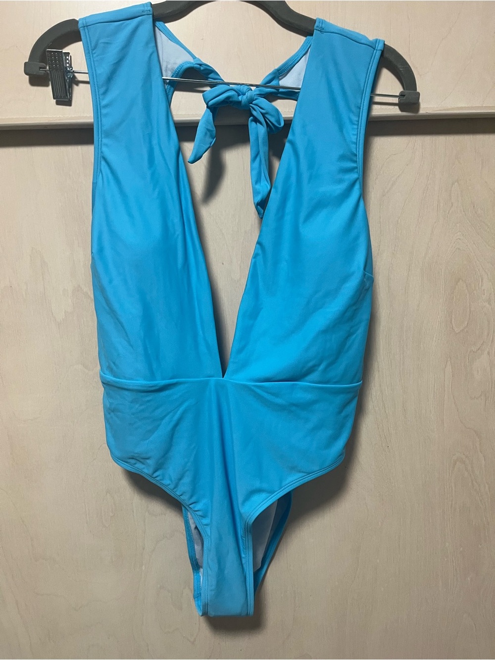 One-Piece Swimsuit — Bright Blue V-Back

Never been worn.